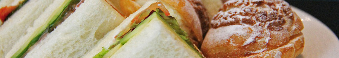 Eating Sandwich at Submarine Galley restaurant in Abington, MA.